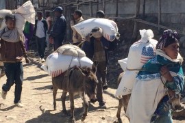 Families begin their journey home from the Estayesh Food Distribution Site in Denkena Kebele, Meket Woreda, Ethiopia [AP]