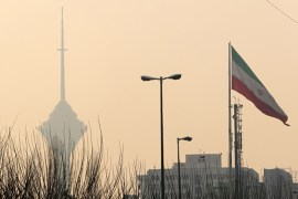 A general view of the Milad telecommunication tower engulfed by smog in the Iranian capital Tehran on December 19, 2015 [AFP]