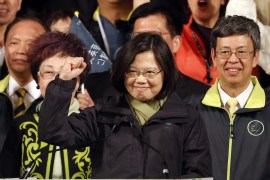 Taiwan''s Democratic Progressive Party, DPP, presidential candidate Tsai Ing-wen raises her hand as she declares victory in the presidential election, in Taipei, Taiwan [AP]