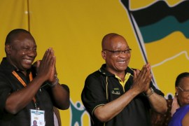 File photo of South Africa''s President Jacob Zuma celebrating his re-election as party President alongside his deputy Cyril Ramaphosa at the National Conference of the ruling African National Congress