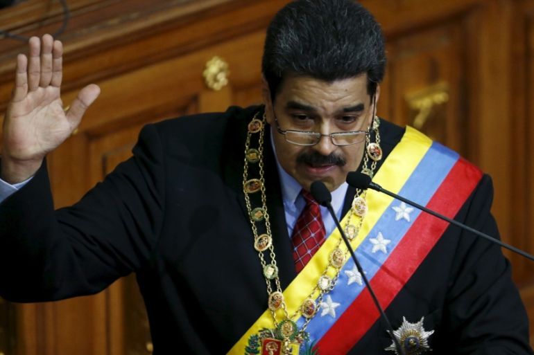 Venezuela''s President Nicolas Maduro gestures while he addresses lawmakers during his annual report of the state of the nation at the National Assembly in Caracas