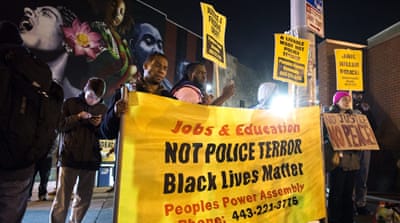 Black protesters rally in December 2015. After a series of incidents of police brutality against African Americans, many blacks wonder if their situation has improved at all during Obama's seven-year presidency [Shawn Thew/EPA]