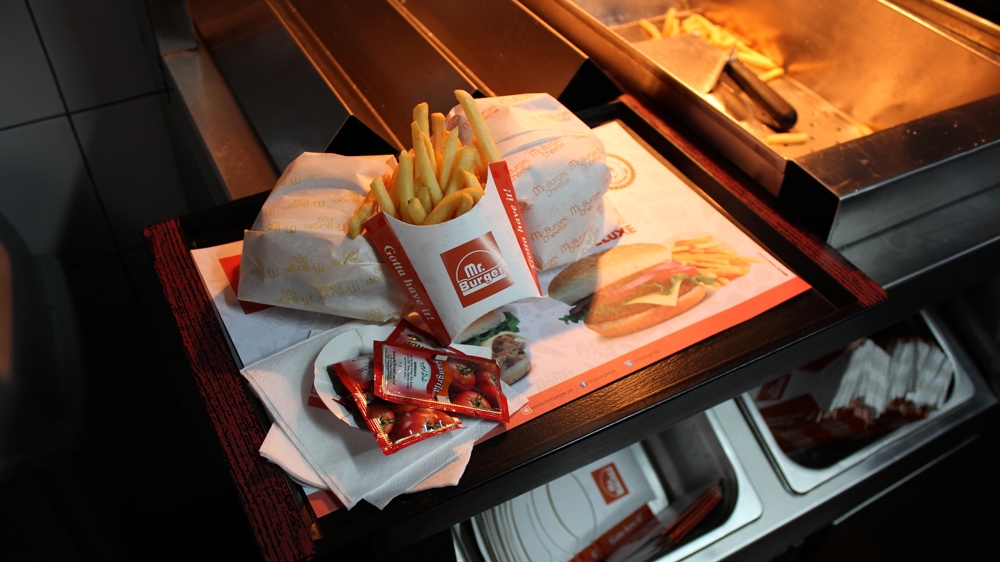 The 'Westernised' customers of Mr Burger were dubbed 'burgers' [Sanam Maher/Al Jazeera]