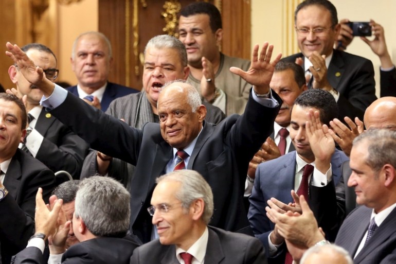 Ali Abdelaal gestures after being elected the speaker of Egypt''s parliament during the opening session at the main headquarters of parliament in Cairo [REUTERS]
