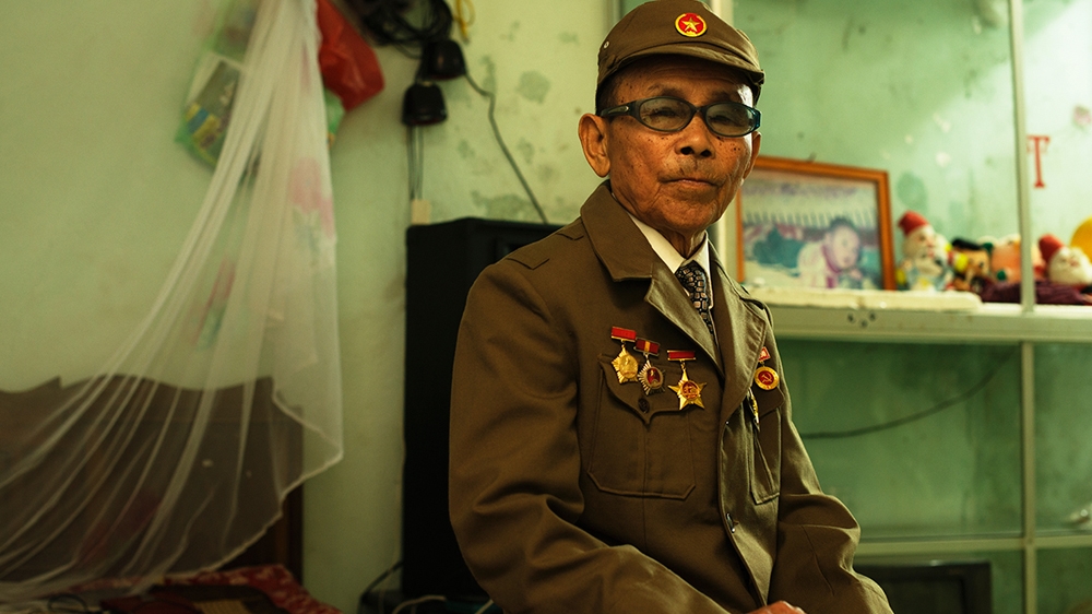Truong Minh Duc, born in 1930, about 1000km from Dien Bien Phu, escorted French prisoners on their 700km walk to the prison camps [Vincenzo Floramo/Al Jazeera] 