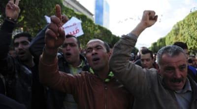 Unemployed Tunisians stage a protest in downtown Tunis [AP]