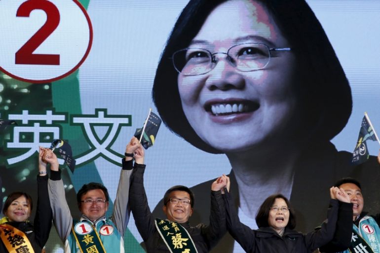 Taiwan''s DPP Chairperson and presidential candidate Tsai Ing-wen shouts slogans during a campaign rally in Taichung, Taiwan