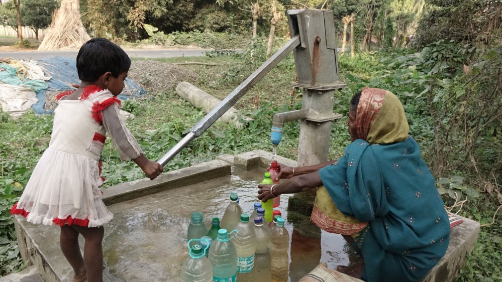In Teghoria village, arsenic-contaminated groundwater has killed scores of people in past years. But locals said that they did not know if the water of the tube well was being tested by the authorities regularly [Shaikh Azizur Rahman/Al Jazeera] 