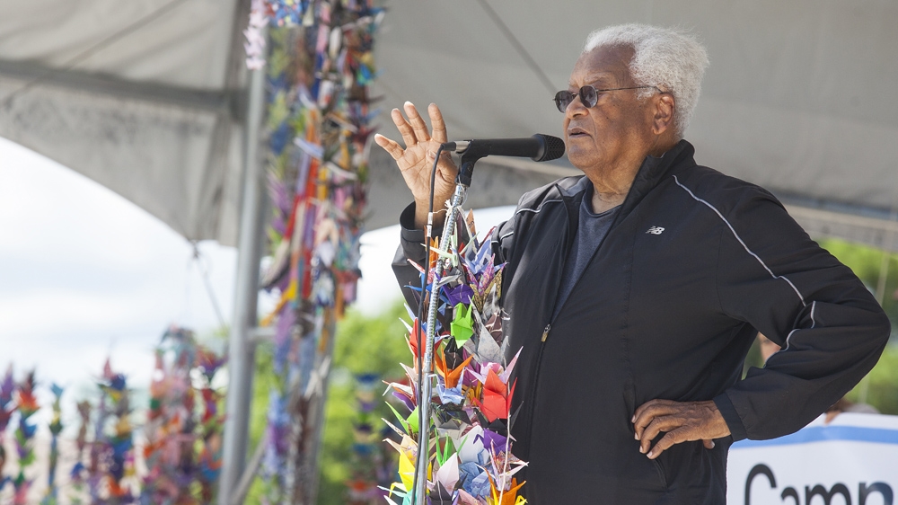 James Lawson, the civil rights leader, speaks on stage at the 70th anniversary of the bombing of Hiroshima and Nagasaki [Gabriela Campos/Al Jazeera]