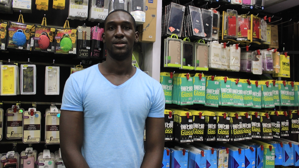 Sembusi Farouk, 24. A levels. Mobile phone storekeeper. Kampala, Uganda [Trinna Leong/Al Jazeera] 