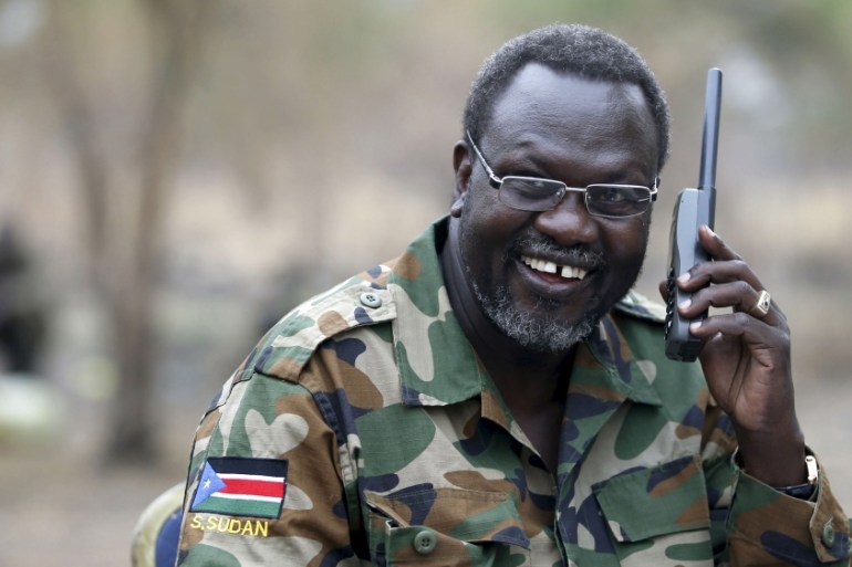File photo of South Sudan''s rebel leader Riek Machar talking on the phone in his field office in a rebel controlled territory in Jonglei State