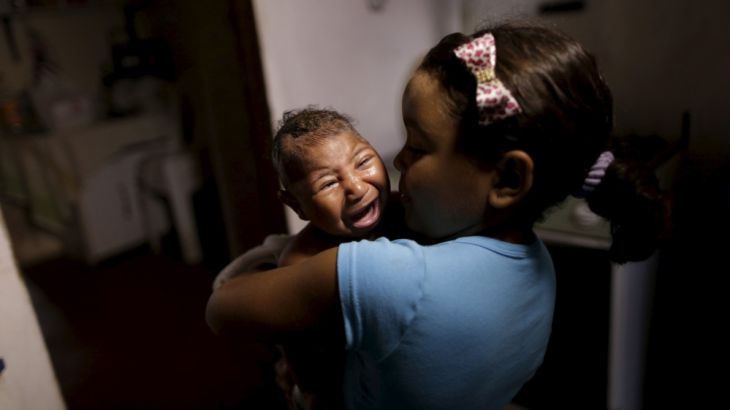 Camile Vitoria embraces her brother Matheus, who has microcephaly, in Recife, Brazil