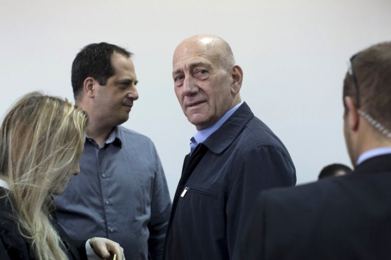 File picture shows former Israeli Prime Minister Ehud Olmert waiting to hear his verdict at Jerusalem District Court