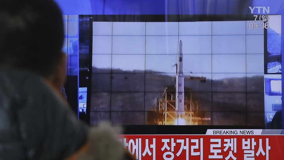 A South Korean man watches footage of a rocket launch by the North earlier this month [AP/Ahn Young-joon]