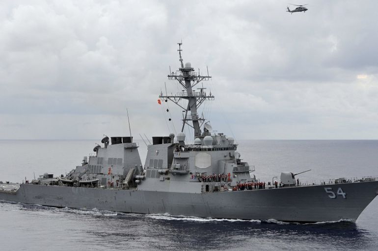 Handout file photo of the U.S. Navy guided-missile destroyer USS Curtis Wilbur patrolling in the Philippine Sea