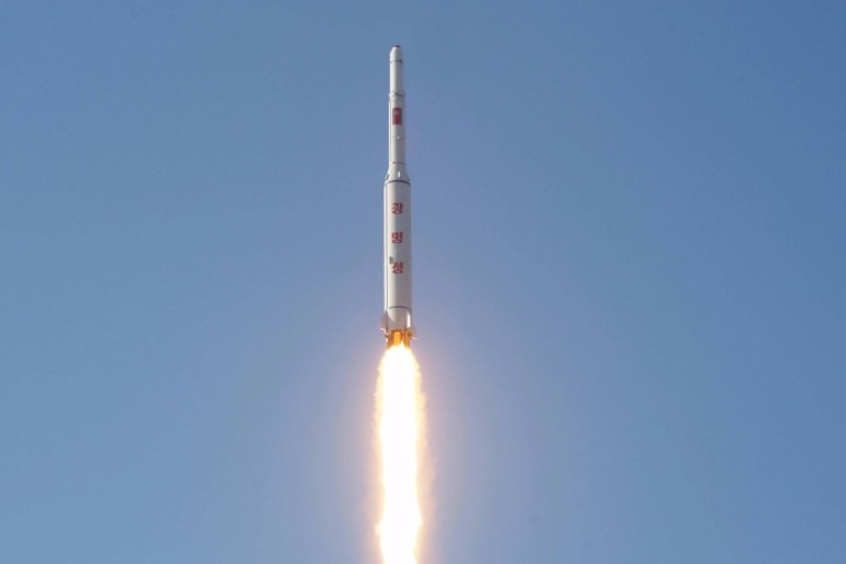 A North Korean long-range rocket is launched into the air at the Sohae rocket launch site in this undated photo released by North Korea''s Korean Central News Agency (KCNA) in Pyongyang