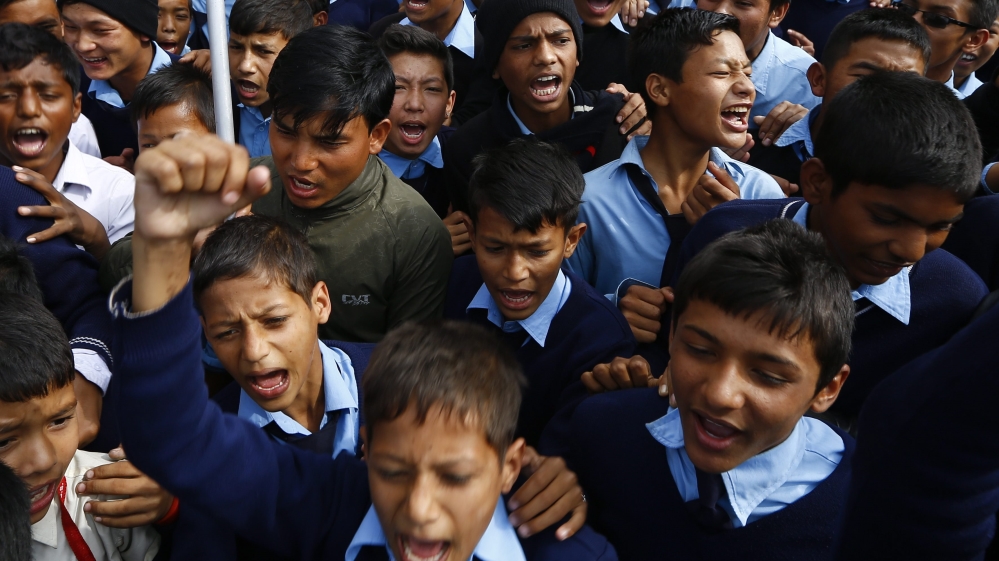 Nepalese schoolchildren shout anti-India slogans during a protest rally in Kathmandu in November [EPA]