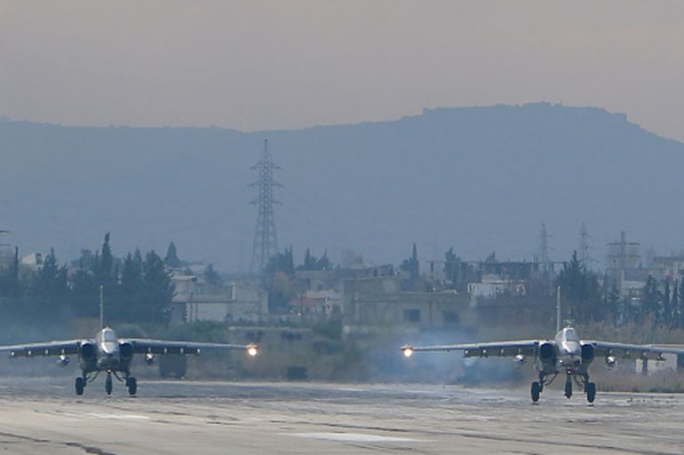 Two Russian Sukhoi Su-24 bombers at the Russian Hmeimim military base in Latakia province, in the northwest of Syria [Getty]