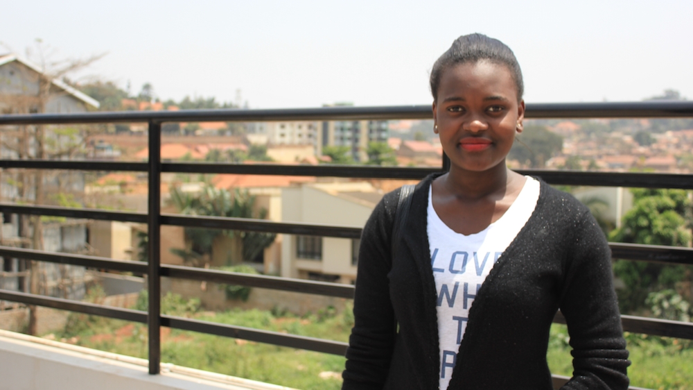 Joy Rovinis, 23, hotel receptionist, Kampala, Uganda [Trinna Leong/Al Jazeera]