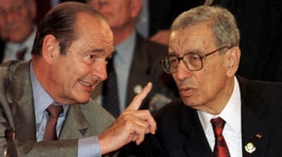 Former UN Secretary-General Boutros Boutros-Ghali chats to then-French President Jacques Chirac (1997) [REUTERS] [Reuters]