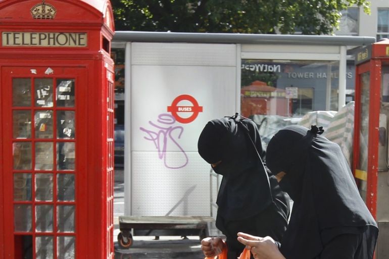 File photograph of women wearing full-face veils as they shop in London