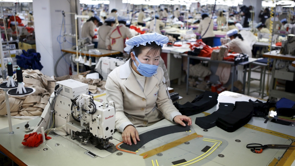 A North Korean employee works in a factory of a South Korean company at the Joint Industrial Park in Kaesong industrial zone, which South Korea is to close [Reuters]