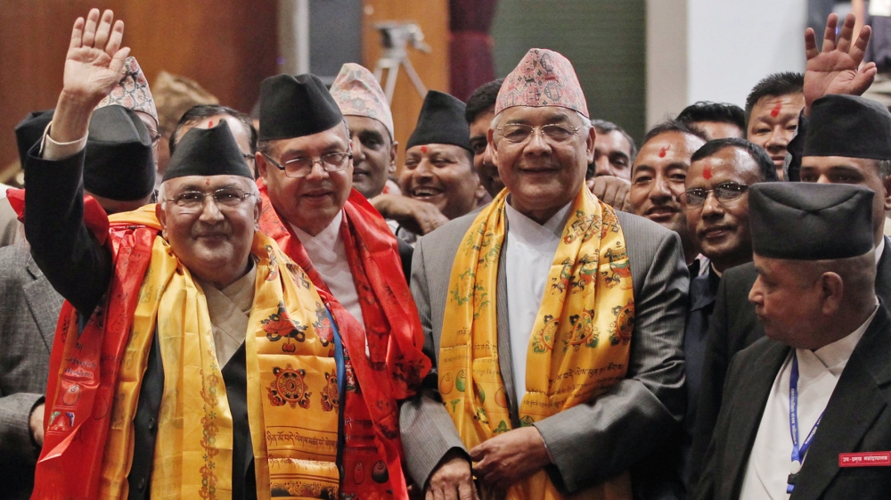 Nepal’s political reconciliation has brought right-wing and left-wing politicians together [AP/Niranjan Shrestha]