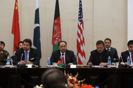 Afghan Foreign Minister, Salahuddin Rabbani, center, starts the meeting to discus a road map for ending the war with the Taliban