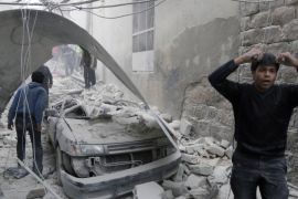 A man that survived shelling reacts amid damage after what activists said was an air strike by forces loyal to Syria''s president Al-Assad in the Al-Maysar neighborhood of Aleppo