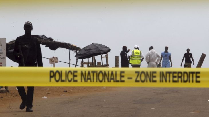 A police cordon is seen while Ivorian police prepare to inspect the area of the hotel Etoile du Sud following an attack by gunmen from al Qaeda''s North African branch, in Grand Bassam