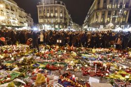 Hundreds of people come together at Place de la Bourse in Brussels to mourn [AP]