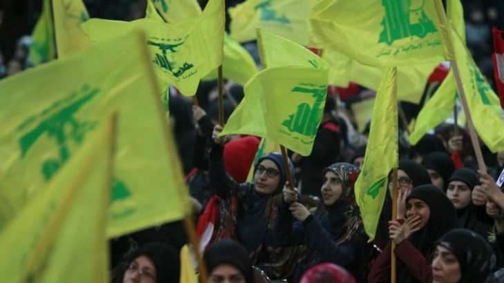 Supporters of Lebanon''s Hezbollah leader Sayyed Hassan Nasrallah wav