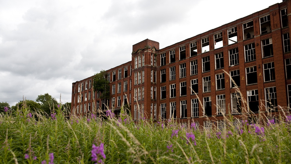 Greater Manchester used to be a more prosperous place as much industry was based there. But now it has gone, leaving abandoned factories and fewer job prospects [David Shaw/Al Jazeera]