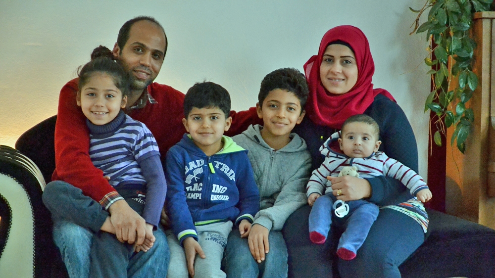The Haki family had their paperwork processed in two files: one for Rami Haki, 37, who was considered a Palestinian national, and another for his wife and children [Adrien le Coarer/Al Jazeera]