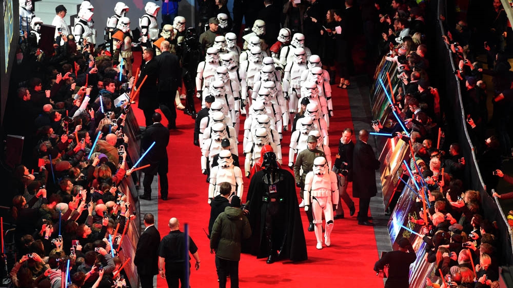 Enthusiasts dressed as characters from Star Wars attend the European premiere of Star Wars: The Force Awakens on December 16, 2015 in London [Stuart C. Wilson/Getty Images]