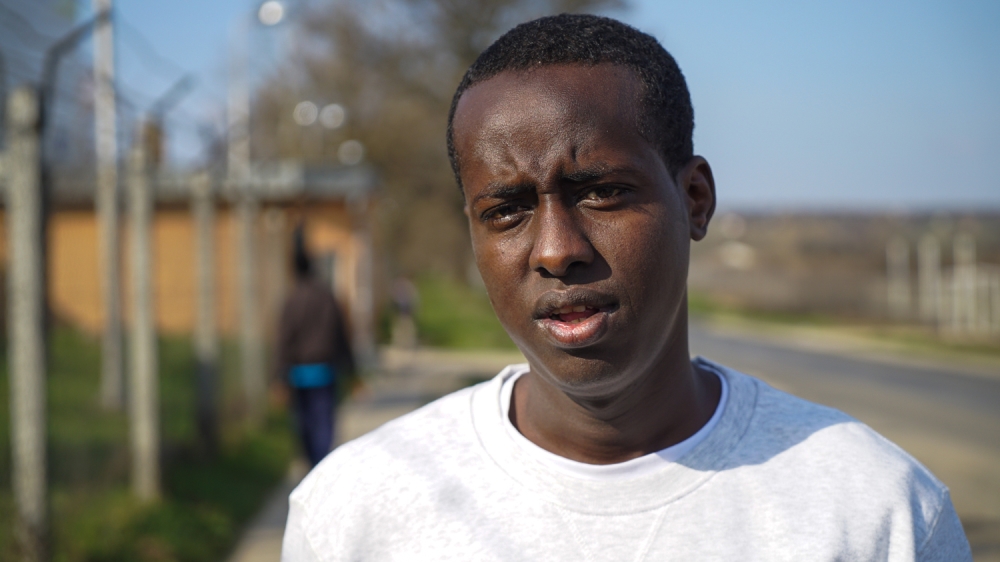 After being shot by Al-Shabab fighters, Mumin lost a kidney and says he would be killed if he were to return to Somalia [Sorin Furcoi/Al Jazeera]