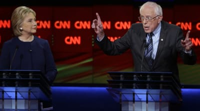 Democratic presidential candidates Bernie Sanders, right, and Hillary Clinton during a Democratic presidential primary debate [AP]