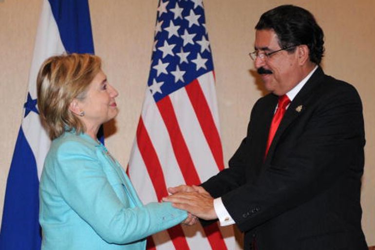 Honduras'' President Manuel Zelaya shakes hands with then US Secretary of State Hillary Clinton in 2006 [AFP]