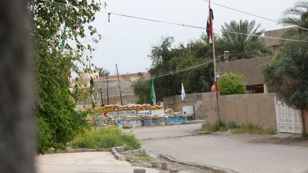 Concrete barriers have been erected in the streets, separating Kurdish and Turkmen neighbourhoods [Al Jazeera]