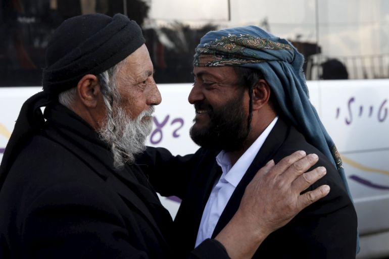 Salman Ichia, one of 19 Jews from Yemen, who were brought to Israel by the quasi-governmental Jewish Agency for Israel, is greeted by a realative at an absorption center in Beersheba, Israel