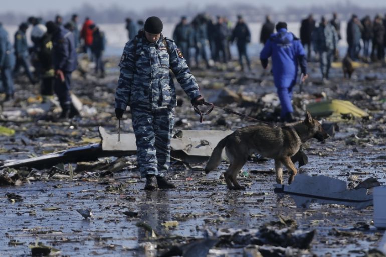 Emergencies Ministry members work at the crash site of a Boeing 737-800 Flight FZ981 operated by Dubai-based budget carrier Flydubai, at the airport of Rostov-On-Don