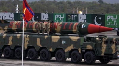 A Pakistani-made Shaheen-III missile, capable of carrying nuclear warheads, is shown off during a military parade to mark Pakistan's Republic Day in Islamabad. [AP]