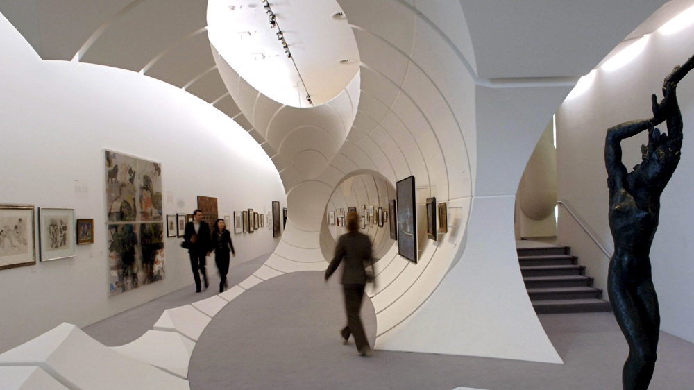 The exhibition '25 years Deutsche Bank collection' at the Guggenheim Museum in Berlin was designed by Zaha Hadid [EPA]