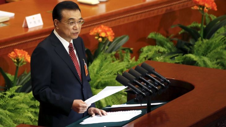 China''s Premier Li Keqiang gives a speech during the opening session of the National People''s Congress in Beijing