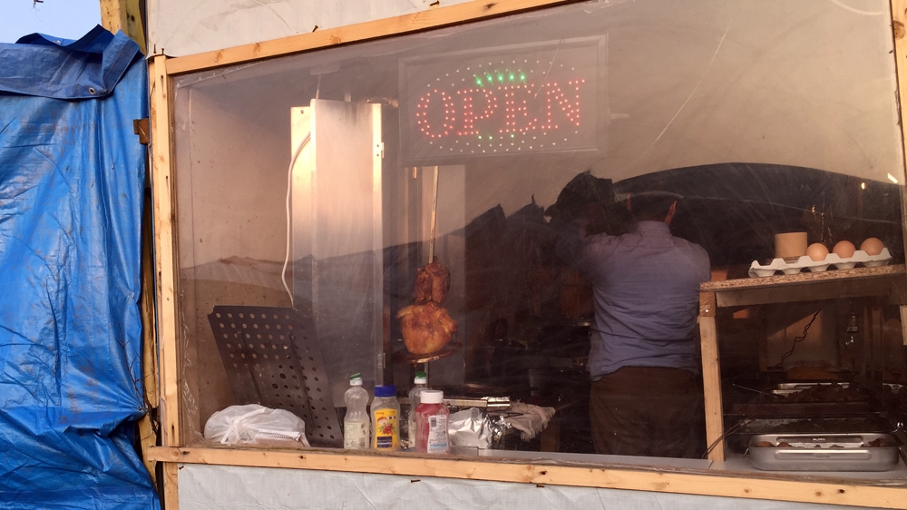 A restaurant in the Calais 'Jungle' [Shafik Mandhai/Al Jazeera]