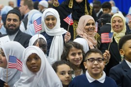 Children from Al-Rahmah school and other guests react after seeing President Barack Obama during his visit to the Islamic Society of Baltimore [AP]