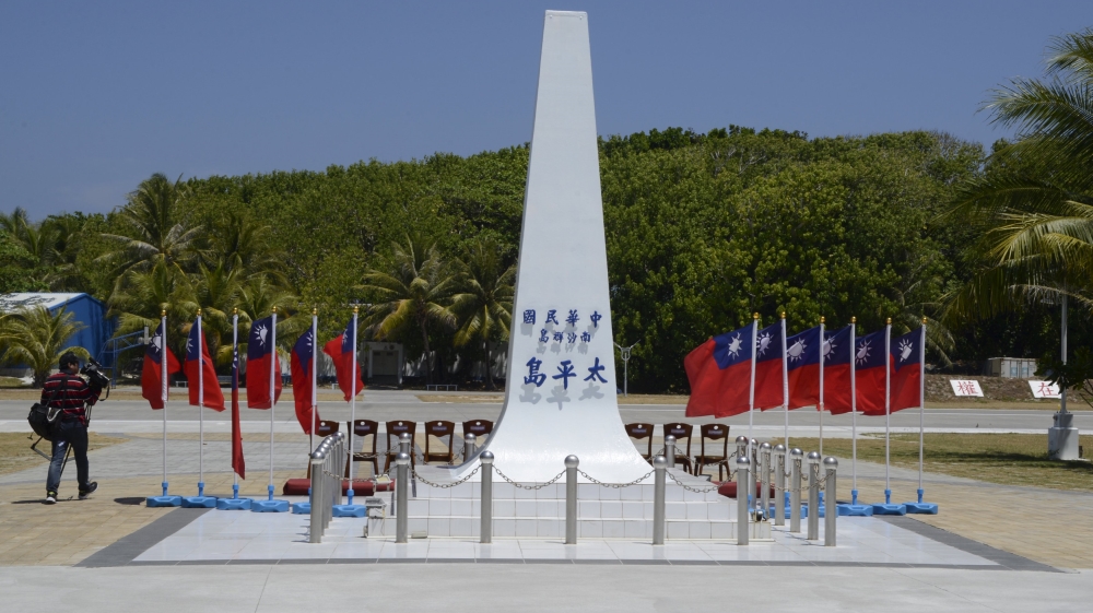 A monument reads 'The Republic of China, Spratly Islands, Taiping island' [Fabian Hamacher/Reuters]