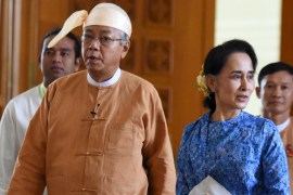 Myanmar''s new president Htin Kyaw (L) and National League for Democracy party leader Aung San Suu Kyi arrives to parliament in Naypyitaw
