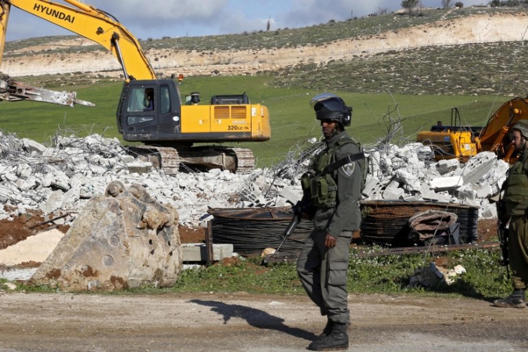 Demolishing a house in the West Bank