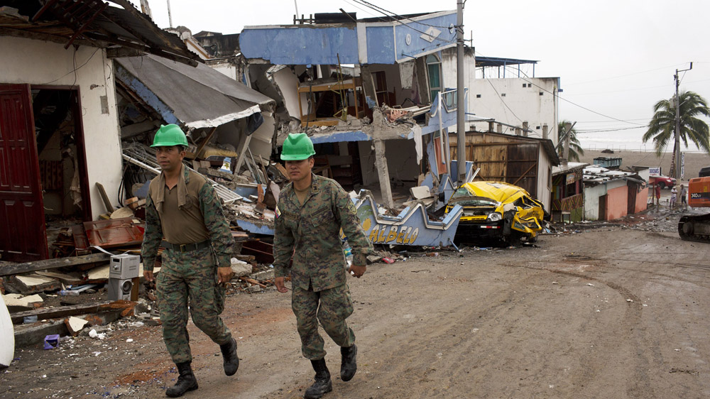 Ecuador's government has estimated that the overall cost of the damage will rise to between $2bn and $3bn [Rodrigo Abd/The Associated Press]